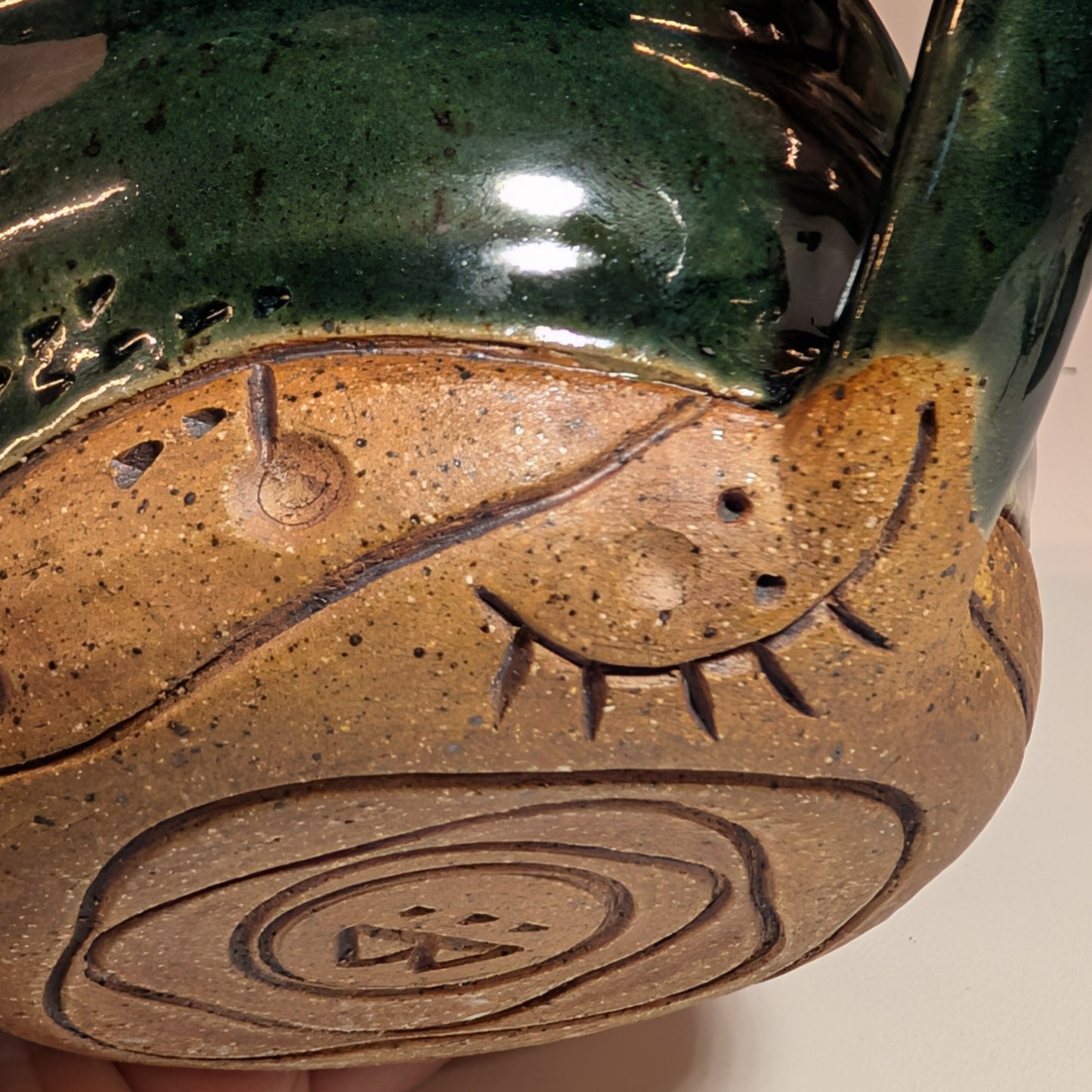 warbly mug carving detail